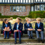 Students sat on the steps